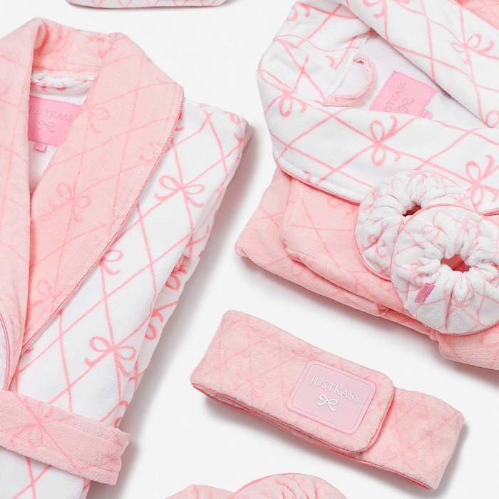 JUSTKASS pink and white beauty flatlay